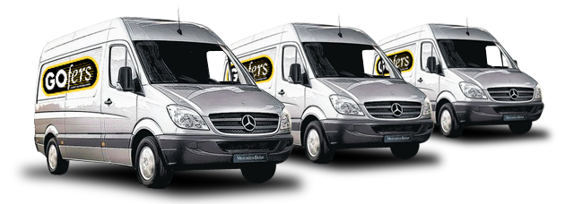 Three silver Mercedes vans with GOfers logos on the sides.