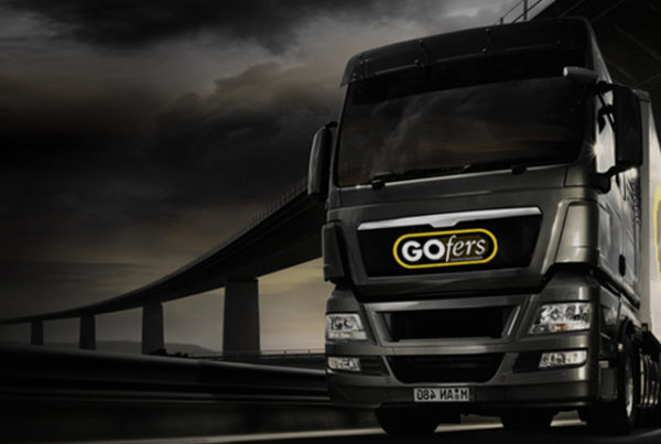 Black lorry with a GOfers logo on the front.